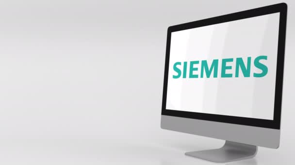 Moderna datorskärm med Siemens logo. 4 k redaktionella klipp — Stockvideo