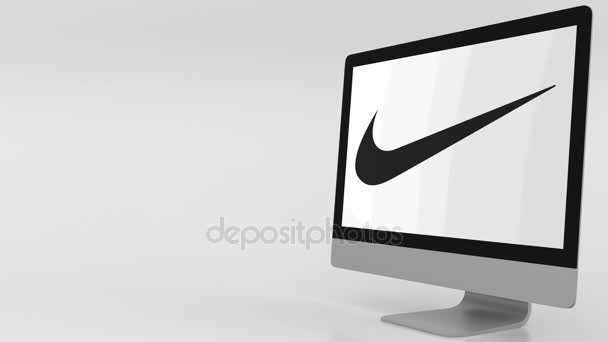 Pantalla de computadora moderna con logotipo de Nike. Clip editorial 4K — Vídeo de stock
