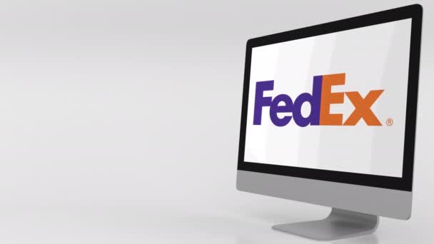 Pantalla de computadora moderna con logotipo de Fedex. Clip editorial 4K — Vídeos de Stock