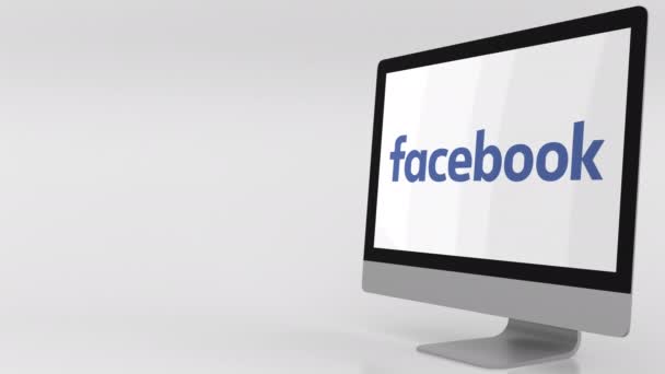 Moderní počítačová obrazovka s logem Facebooku. 4 k redakční klip — Stock video