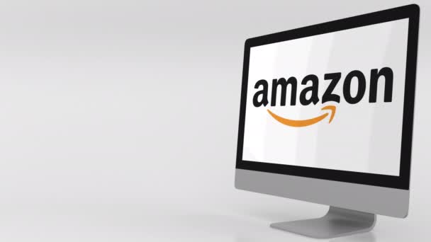 Moderni tietokoneen näyttö Amazon logo. 4K toimituksellinen leike — kuvapankkivideo