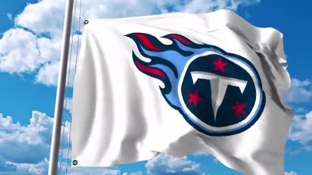 Wapperende vlag met Tennessee Titans professioneel team logo. 4 k redactionele clip — Stockvideo