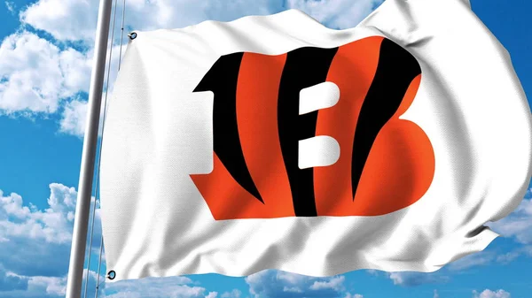 Bandera ondeando con el logotipo del equipo profesional de Cincinnati Bengals. Representación Editorial 3D — Foto de Stock