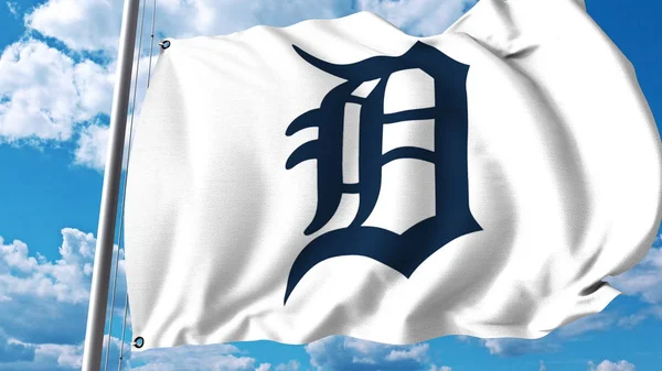 Viftande flagga med Detroit Tigers professionellt team logo. Redaktionella 3d-rendering — Stockfoto