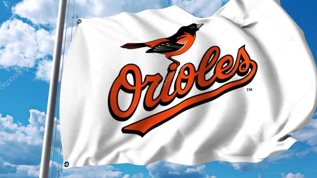 Waving flag with Baltimore Orioles professional team logo. Editorial 3D