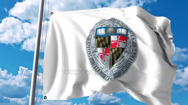 Bandeira acenando com o emblema da Universidade Johns Hopkins. Clipe editorial 4K — Vídeo de Stock