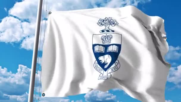 Toronto Üniversitesi amblemi ile bayrak sallıyor. 4 k editoryal klip — Stok video