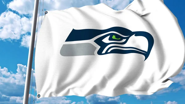 Viftande flagga med Seattle Seahawks professionellt team logo. Redaktionella 3d-rendering — Stockfoto