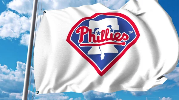 Wapperende vlag met Philadelphia Phillies professioneel team logo. Redactioneel 3D-rendering — Stockfoto