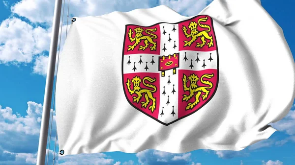 Machać flaga z godłem Uniwersytetu Cambridge. Redakcji renderowania 3d — Zdjęcie stockowe