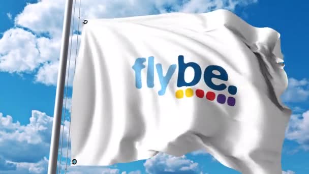 Размахиваю флагом с логотипом Flybe. Редакционный клип 4К — стоковое видео