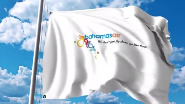 Bandiera sventolante con logo Bahamasair. Clip editoriale 4K — Video Stock