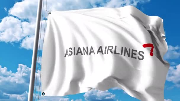 Bandera ondeante con logo Asiana Airlines. Clip editorial 4K — Vídeos de Stock