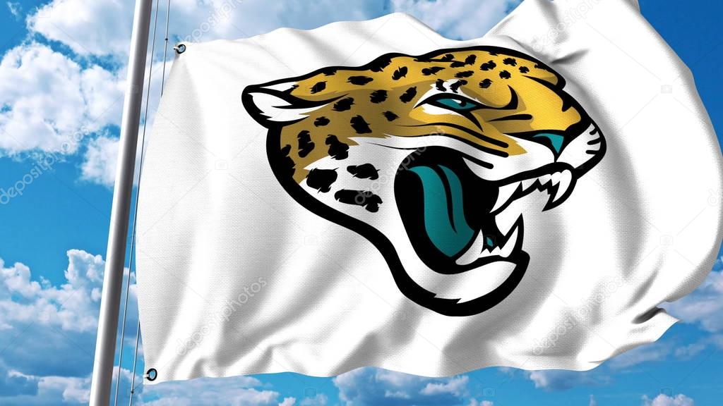 Waving flag with Jacksonville Jaguars professional team logo. Editorial 3D