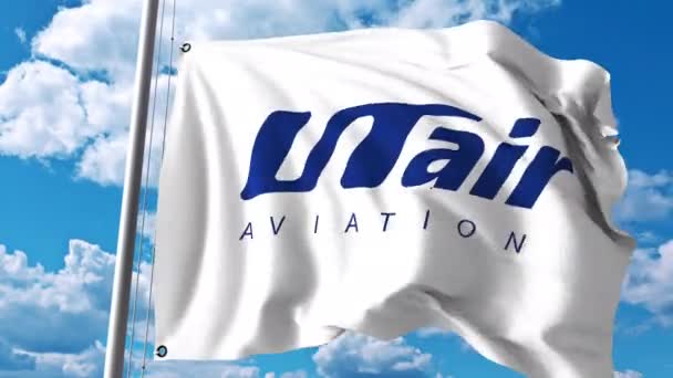 Flagge schwenkend mit utair Aviation Logo. 4k Editorial Clip — Stockvideo