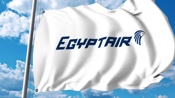 Acenando bandeira com logotipo EgyptAir. Renderização 3D — Fotografia de Stock