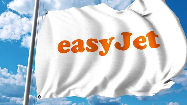 Bandera ondeante con logotipo de Easyjet. Renderizado 3D — Foto de Stock