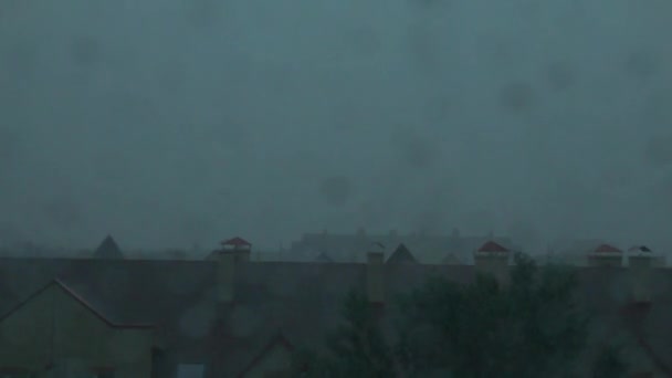 Roofs of town houses in the thunderstorm. Slow motion video of lightning — Stock Video