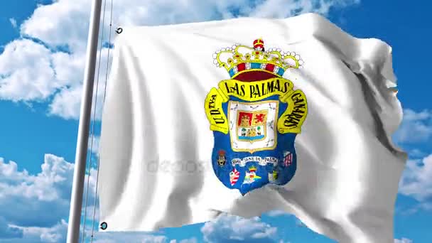 Heiluttaa lippua UD Las Palmas jalkapalloseuran logo. 4K toimituksellinen leike — kuvapankkivideo