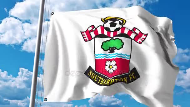 Wapperende vlag met Southampton Fc voetbal club logo. 4 k redactionele clip — Stockvideo