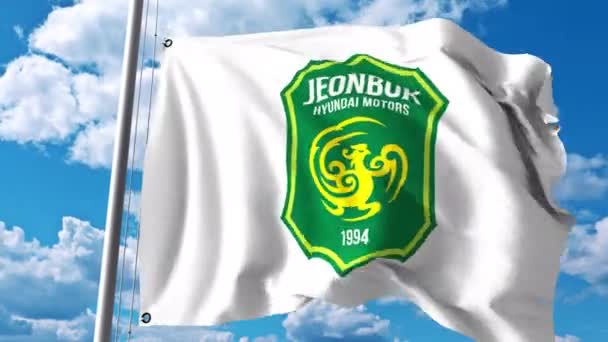 Drapeau avec logo du club de football Jeonbuk Hyundai Motors FC. Clip éditorial 4K — Video