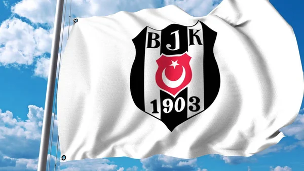 Bandera ondeando con el logotipo del club de fútbol Besiktas. Representación Editorial 3D — Foto de Stock