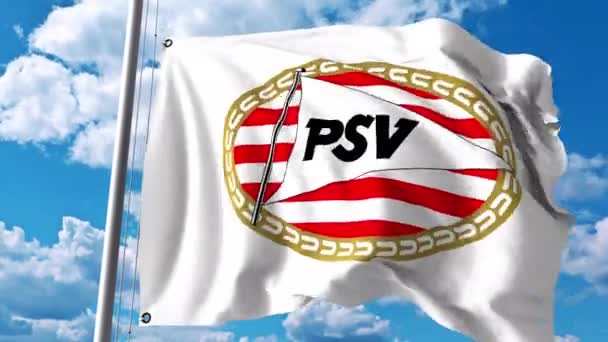 Macha flagą z logo klubu piłki nożnej Psv Eindhoven. 4 k Video Redakcja — Wideo stockowe