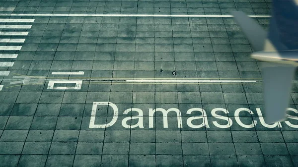 Vista aérea de un avión que llega al aeropuerto de Damasco. Viaje a Siria 3D renderizado —  Fotos de Stock