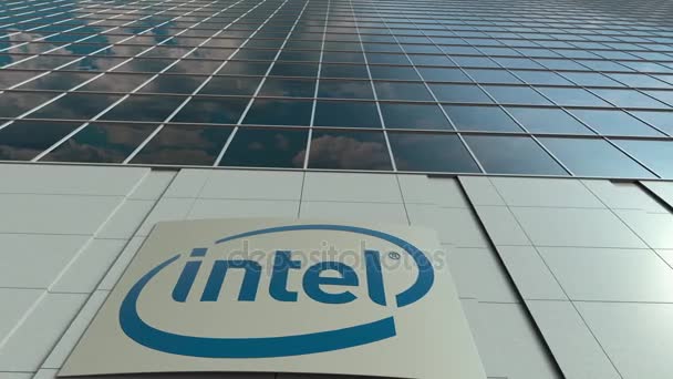 Вывеска с логотипом корпорации Intel. Прошло время фасада современного офисного здания. Редакционная 3D рендеринг — стоковое видео