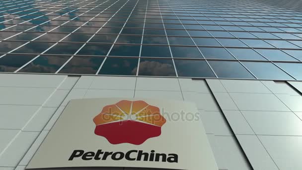 Signalisatie bord met Petrochina logo. Moderne gevel time-lapse kantoorgebouw. Redactioneel 3D-rendering — Stockvideo