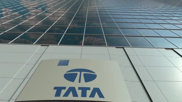 Signage board with Tata Group logo. Modern office building facade time lapse. Editorial 3D rendering — Stock Video