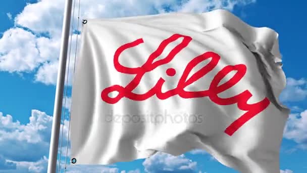 Eli Lilly ve şirket logolu bayrak sallıyor. 4 k editoryal animasyon — Stok video