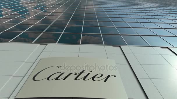Вывеска с логотипом Cartier. Прошло время фасада современного офисного здания. Редакционная 3D рендеринг — стоковое видео