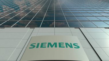 Signage board with Siemens logo. Modern office building facade. Editorial 3D rendering clipart