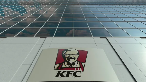Signalisatie bord met Kentucky Fried Chicken Kfc logo. Moderne kantoor gebouw gevel. Redactioneel 3D-rendering — Stockfoto