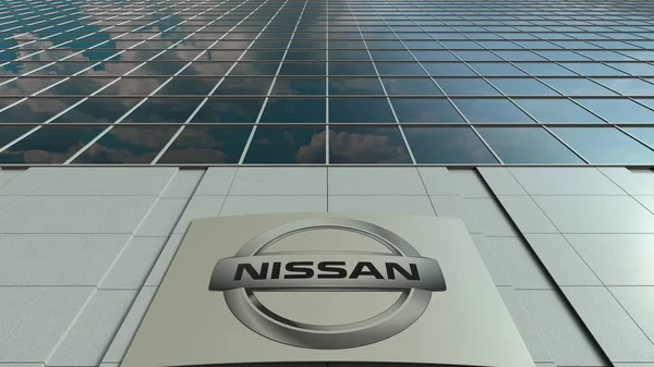 Tablero de señalización con logotipo de Nissan. Moderna fachada del edificio de oficinas. Representación Editorial 3D — Foto de Stock