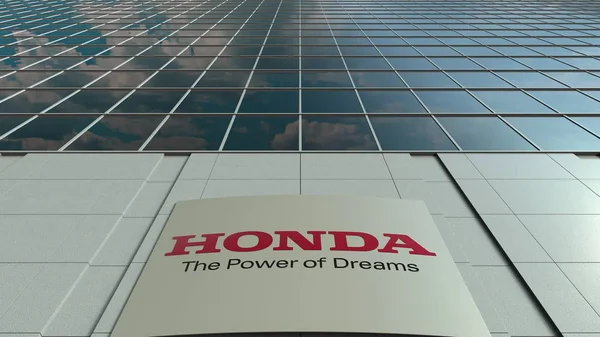 Signalisatie bord met Honda logo. Moderne kantoor gebouw gevel. Redactioneel 3D-rendering — Stockfoto