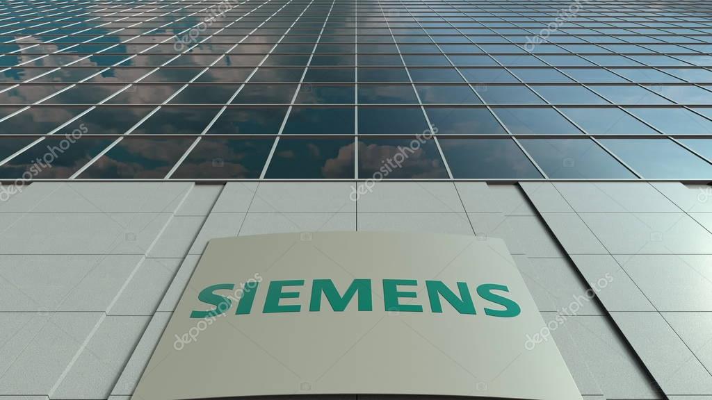 Outdoor signage board with Siemens logo. Modern office building. Editorial 3D