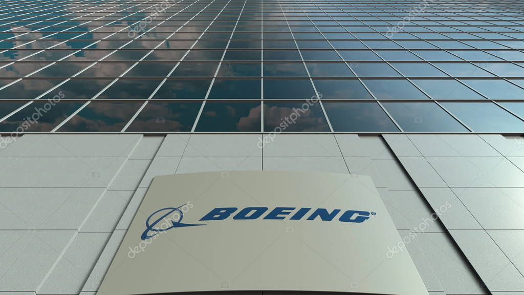 Outdoor signage board with Boeing Company logo. Modern office building. Editorial 3D