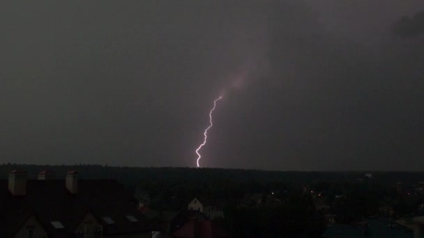 Super slow motion shot of a spectacular lightning strike in residential area at night — Stock Video
