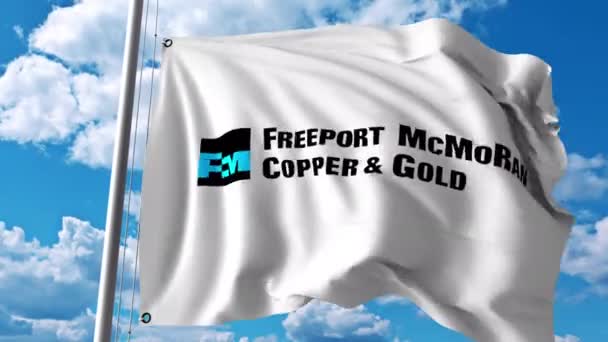 Wapperende vlag met Freeport Mcmoran logo. 4 k redactionele animatie — Stockvideo