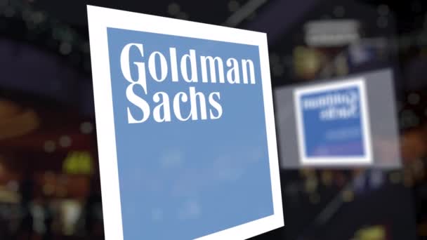 De Goldman Sachs Group, Inc-logo op het glas tegen wazig zakencentrum. Redactioneel 3D-rendering — Stockvideo