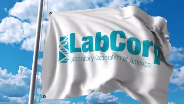 Bandera ondeando con el logotipo de LabCorp. Animación editorial 4K — Vídeos de Stock