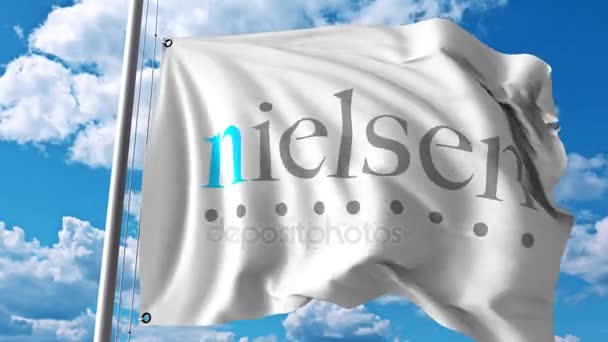 Acenando bandeira com logotipo Nielsen Holdings. Animação editorial 4K — Vídeo de Stock