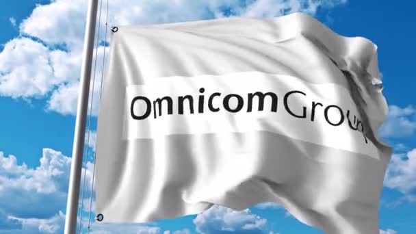 Bandera ondeando con el logotipo de Omnicom Group. Animación editorial 4K — Vídeo de stock