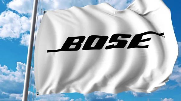 Bandiera sventolante con logo Bose Corporation. Rendering 3D editoriale — Foto Stock