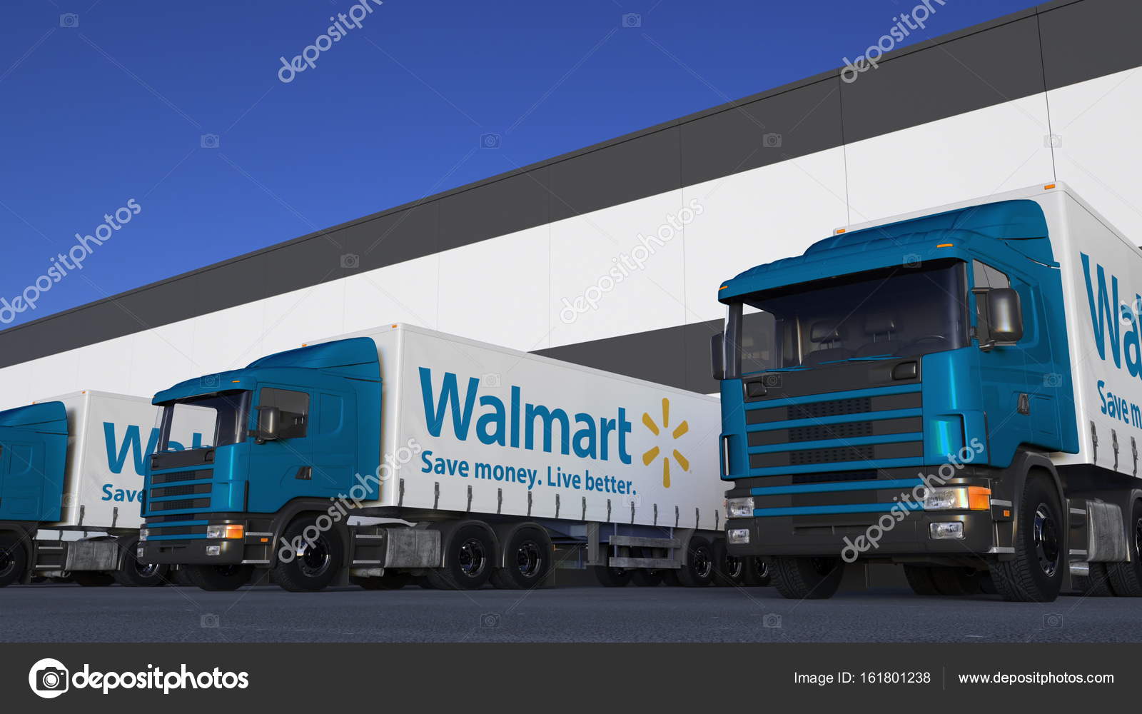 Freight semi trucks with Walmart logo loading or unloading at warehouse