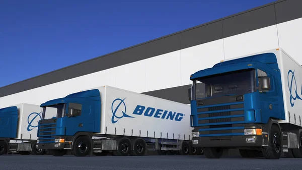 Ημι φορτηγών μεταφορών με το λογότυπο της εταιρείας Boeing φόρτωσης ή εκφόρτωσης στην αποβάθρα της αποθήκης. Συντακτική 3d rendering — Φωτογραφία Αρχείου