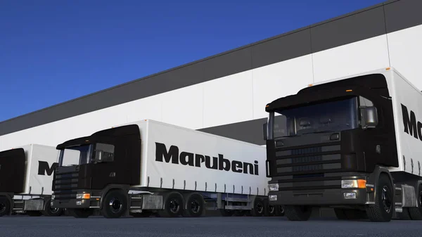 Грузовые полугрузовики с логотипом Marubeni Corporation погрузка или разгрузка на складе док. Редакционная 3D рендеринг — стоковое фото