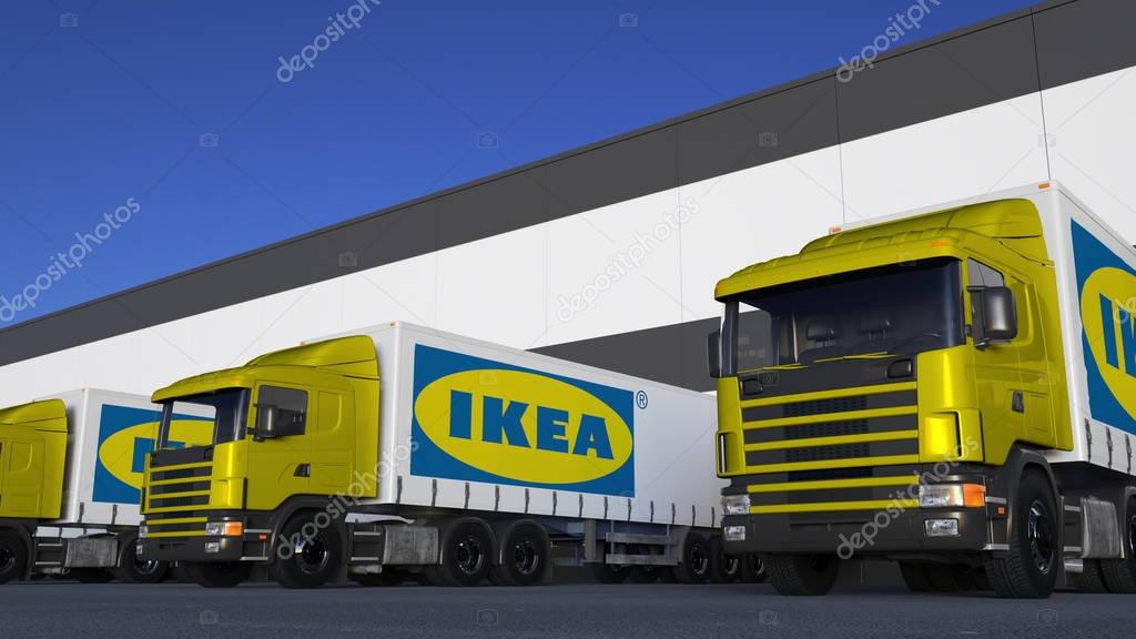 Freight semi trucks with Ikea logo loading or unloading at warehouse dock. Editorial 3D